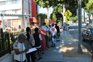 Community queued for the start of the health services event